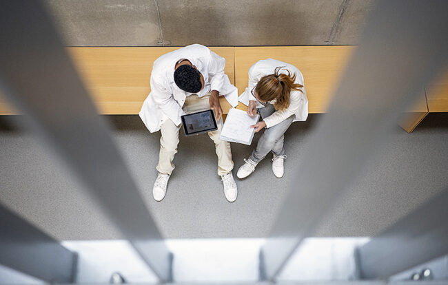 Scientists walking in the corridor